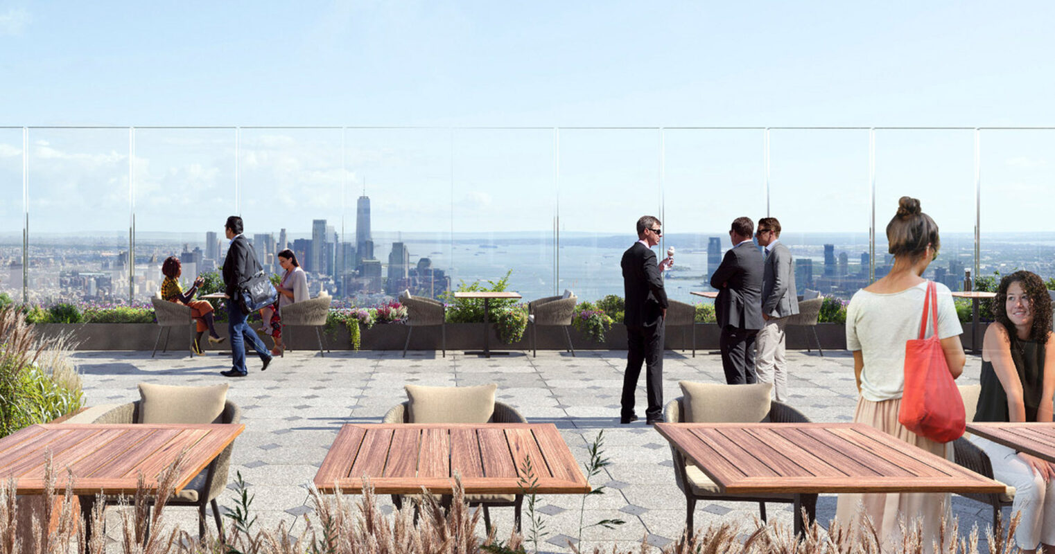 Rooftop patio space with minimalist wooden benches surrounded by flourishing wild grass. Transparent glass panels ensure uninterrupted views of the city skyline, facilitating an integrated experience between urban vistas and natural landscaping. People engage in conversation, adding lively human interaction to the serene setting.