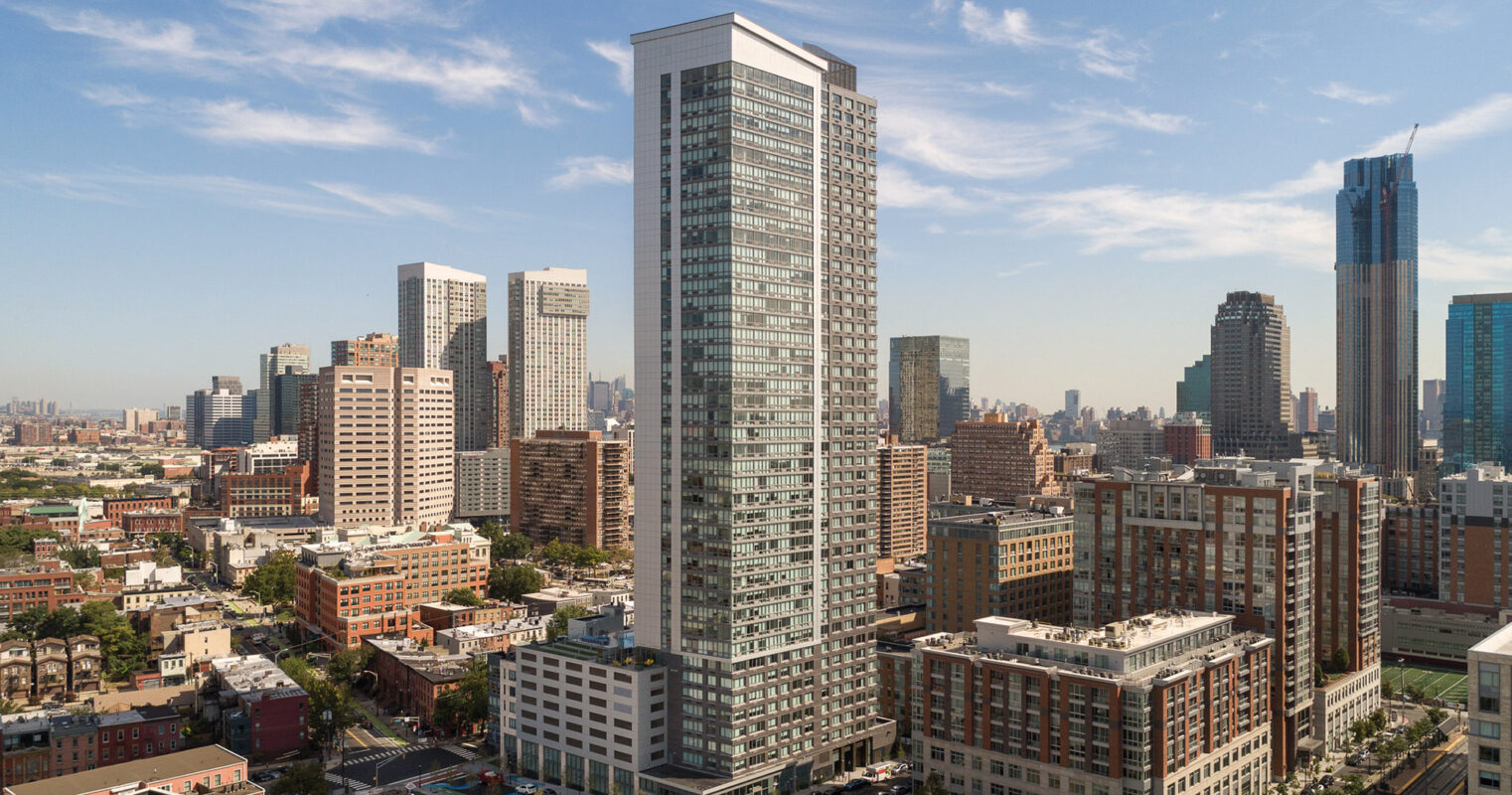 Urban vibrance: a crisp view of modern high-rise buildings amidst a sprawling cityscape.