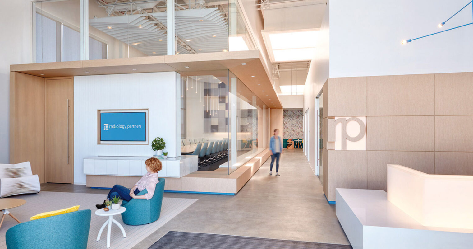 Bright, airy office lobby incorporating a blend of natural and artificial lighting, featuring a minimalist reception desk, contemporary furniture with clean lines, and a calm color palette accented by pops of blue. Textured elements add depth to the open-concept space.